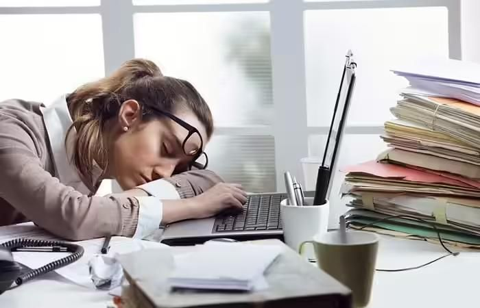 Frustrated woman at desk